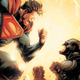 Cover of Injustice: Year One: The Complete Collection illustration by Jheremy Raapack features Superman with a chinstrap going head to head with Batman..